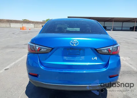 2018 Toyota Yaris Ia из США, поврежденный, VIN 3MYDLBYV7JY314998